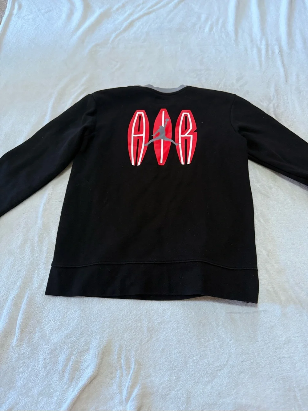 Nike Black Sweatshirt with Red Jordan Logo and Gray Neck Trim